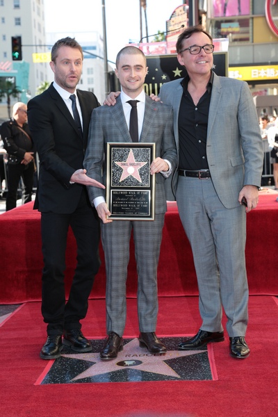 Daniel Radcliffe is flamed by Chris Hardwick and Chris Coumbus as Daniel Radcliffe receives the 2,565th Star on the Hollywood Walk of Fame on Thursday, November 12, 2015 in Los Angeles, CA (Photo: Alex J Berliner/ABImages