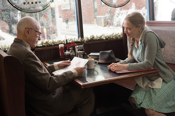 (Left to right) Alan Arkin and Amanda Seyfried in LOVE THE COOPERS to be released by CBS Films and Lionsgate.